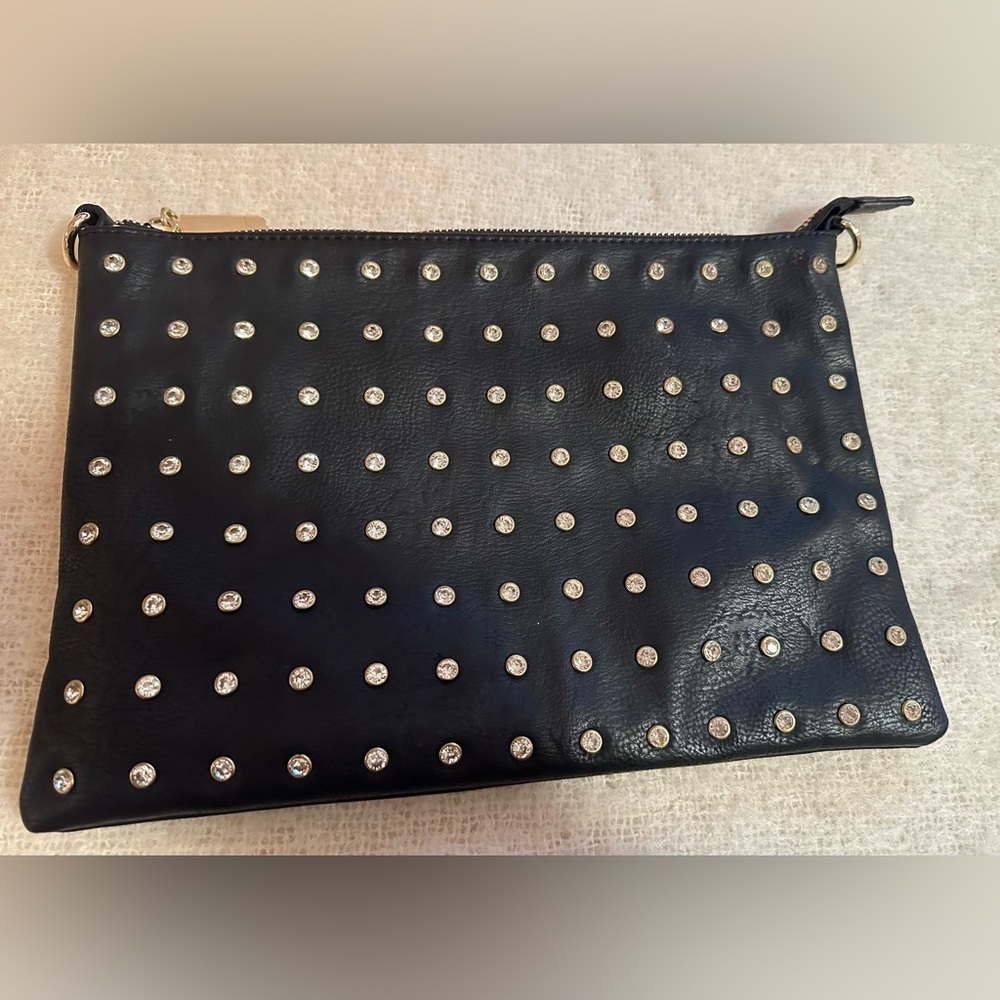 Beautiful clutch not leather with rhinestones.